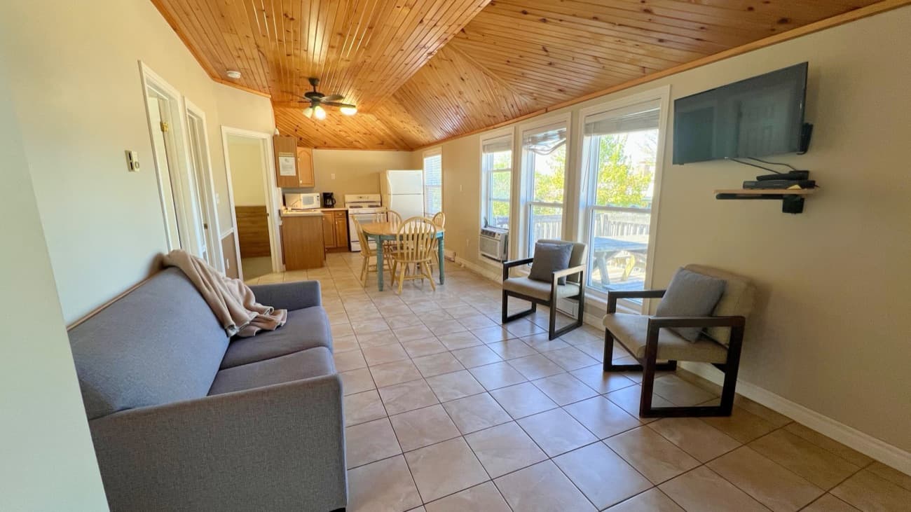 3-bedroom cottage living room with pine ceiling at Hall's Cottages, Georgian Bay